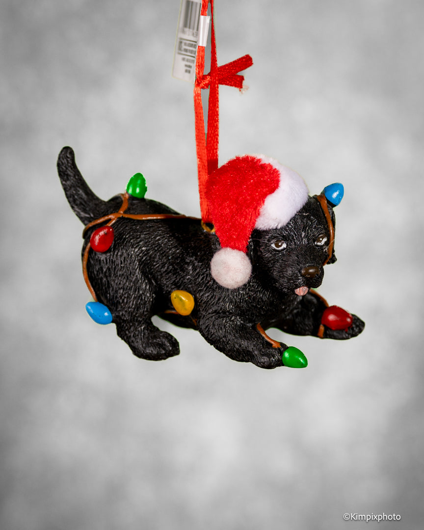 Juletrepynt Valp med nisselue og juletrelys