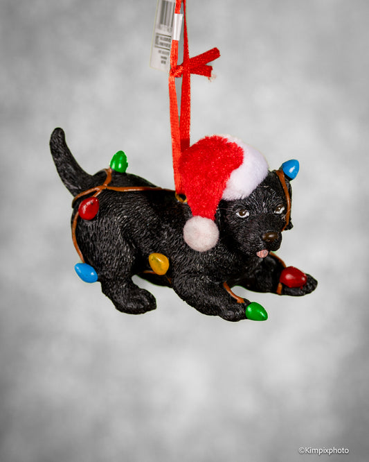 Juletrepynt Valp med nisselue og juletrelys